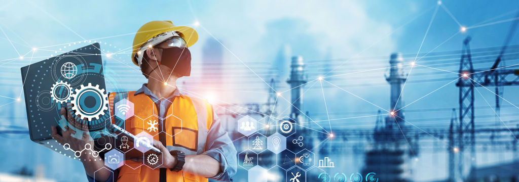 Man industrial engineer using Laptop computer checking and analysis data of power plant station project on blue background